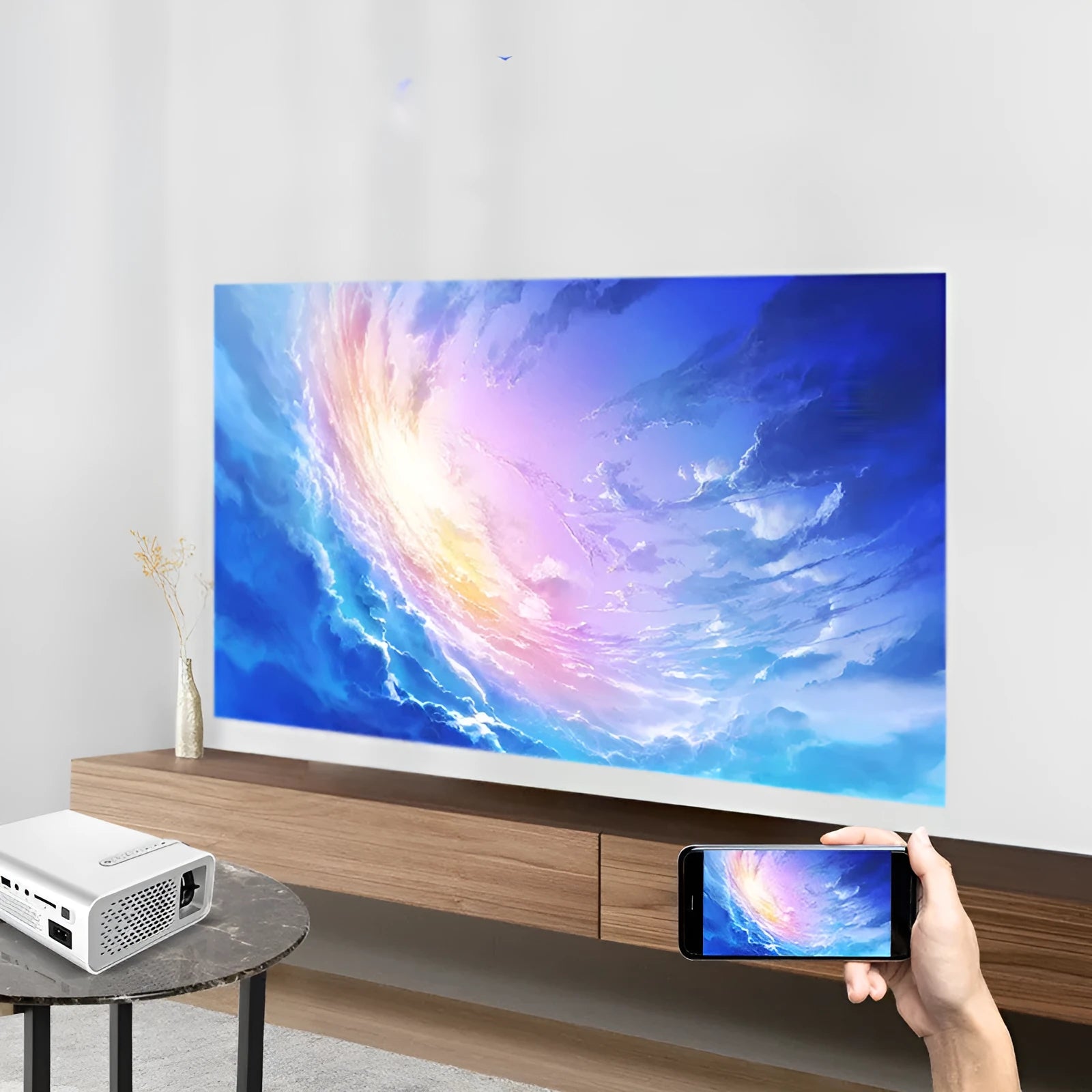 YG530 mini mobile phone projector in black or white showing wireless connection to smartphone