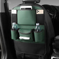 Leather car seat back storage bag hanging from a headrest, shown in brown colour.
