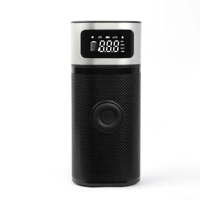 Black portable wireless smart vehicle air pump with a display, inflation tube, and multiple nozzles on a dark background.
