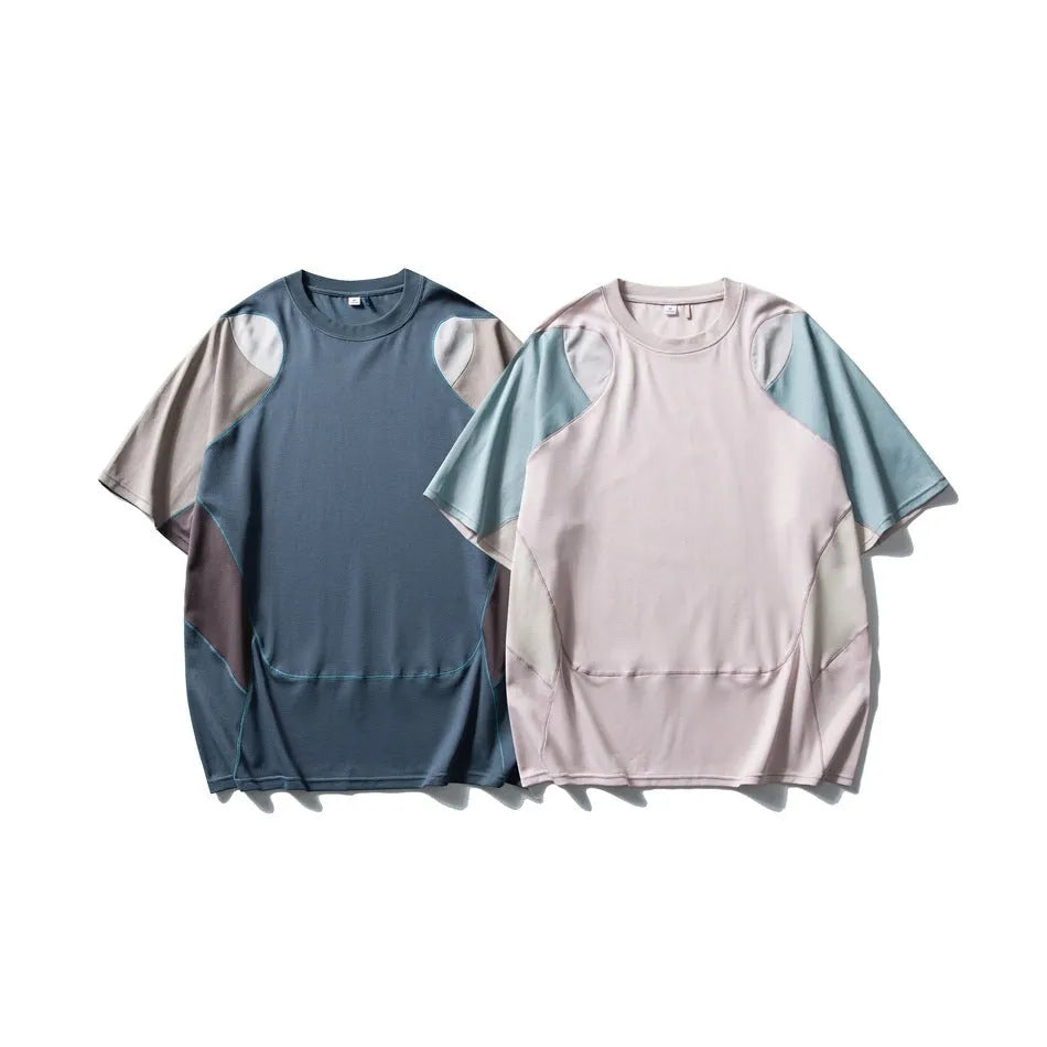 Men's loose blue patchwork contrast short sleeve cotton blend t-shirt on a hanger.
