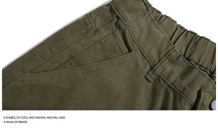 Casual wide-leg cropped workwear pants in apricot colour with elastic mid waist and rivet detailing