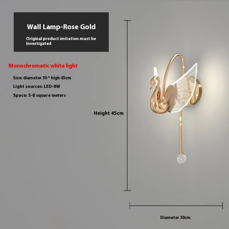 Gold swan-shaped LED wall lamp with acrylic shade and iron construction for bedroom lighting