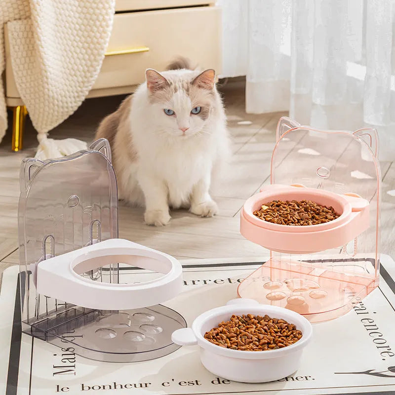 Grey pet feeding bowl with cat ear design and removable hanging cage attachment