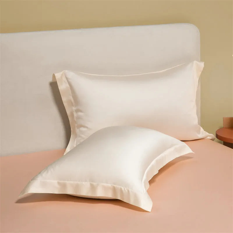 Lenzing Tencel quilt cover and sheet set in a modern colour like Aurora Blue, showing satin weave texture.