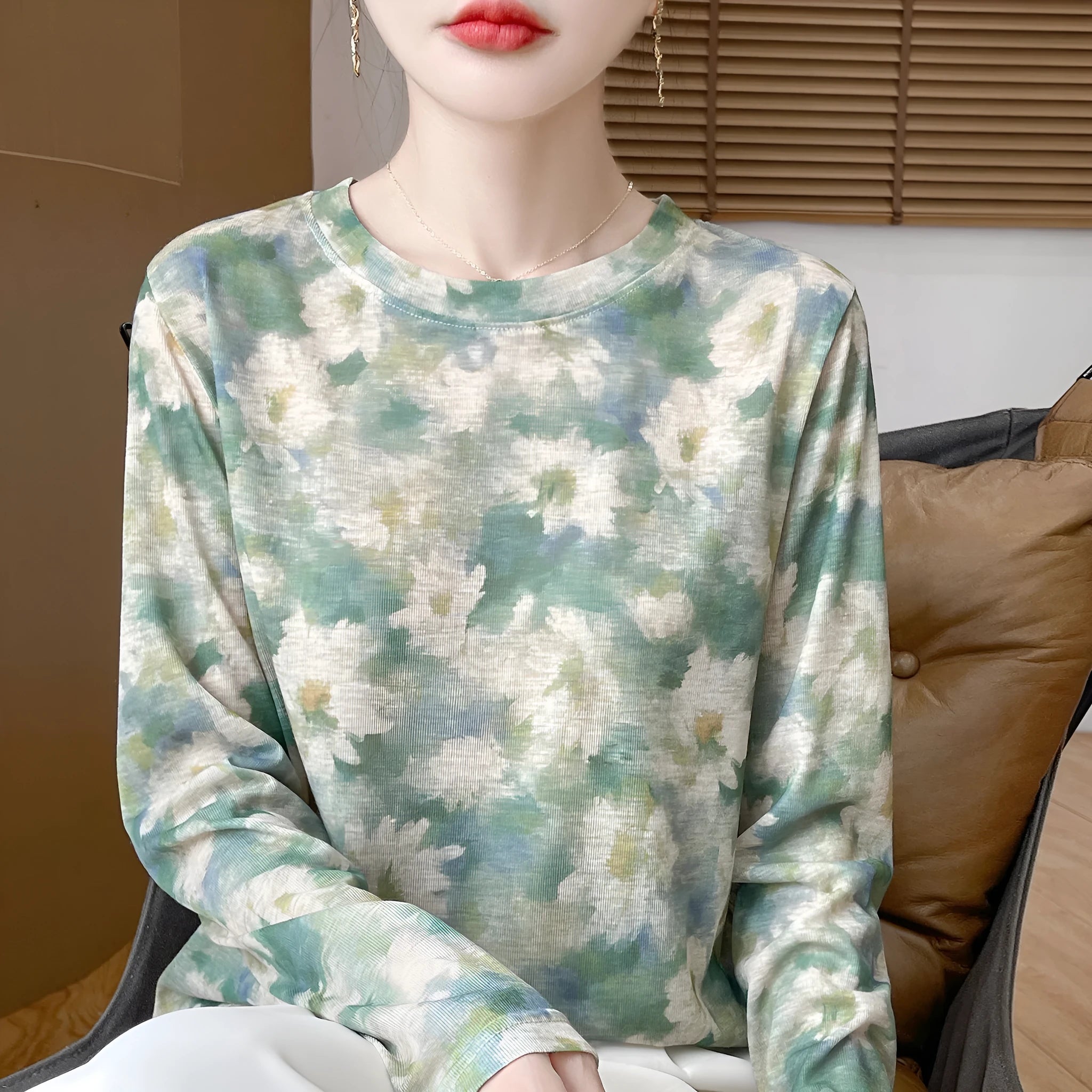 Women's round neck pullover shirt in Tencel cotton with a yellow roses floral print design.