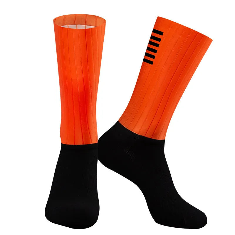 A pair of athletic socks for cycling and running in a chemical fibre blend, shown in one of six available colours.