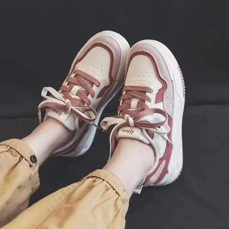 Beige and pink women's low-top rubber sneakers with a hidden height increase sole.