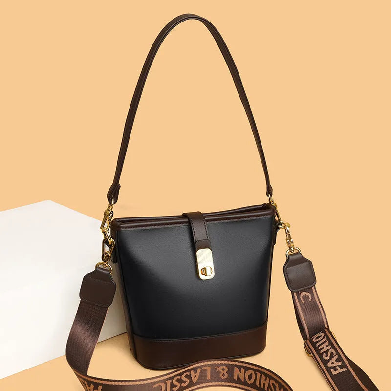 Korean style black PU bucket messenger bag with organised interior compartments and double shoulder straps