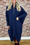 Women's solid colour knitted loose dress with zip and raglan sleeves, shown in dark green.