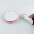 Velvet makeup remover pads in red and blue colours showing soft texture and circular shape