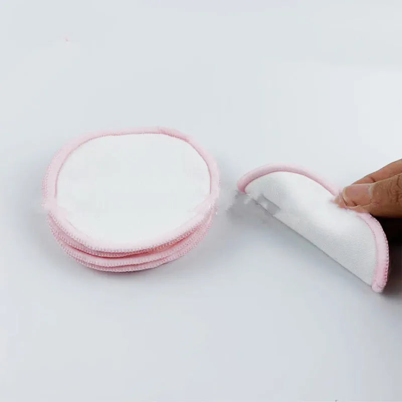 Velvet makeup remover pads in red and blue colours showing soft texture and circular shape