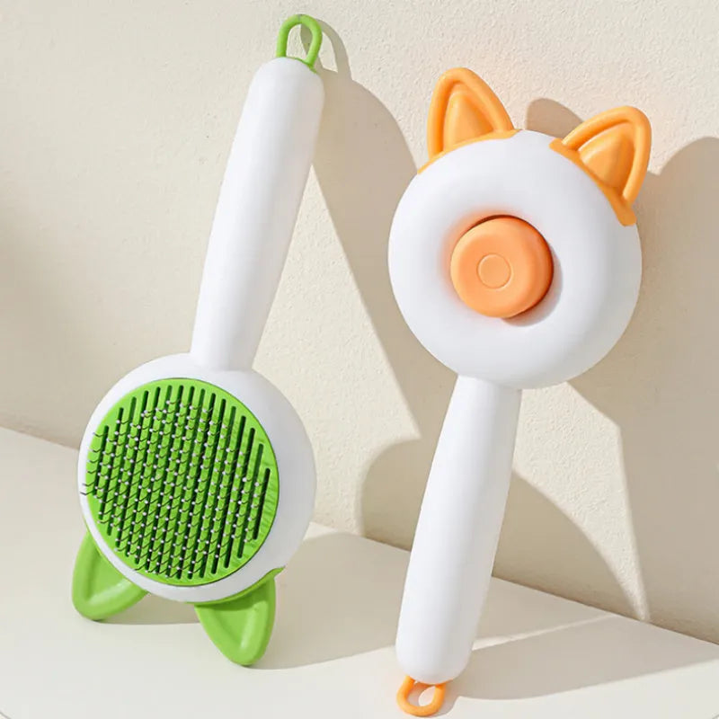 Self-cleaning pet grooming brush with stainless steel comb teeth in greenish white and orange white colour options