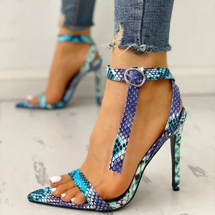 Blue serpentine high heels with a toe buckle and hollow-out design on the artificial PU upper.