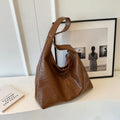 PU leather large shoulder bag with adjustable strap and zip closure in multiple colour options