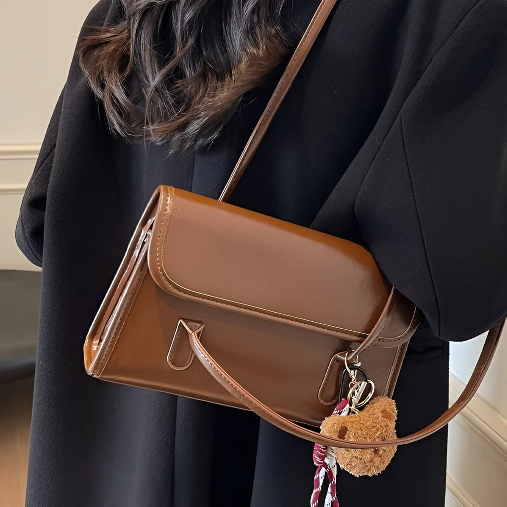 Women's brown PU leather square shoulder bag with decorative pendant and double strap