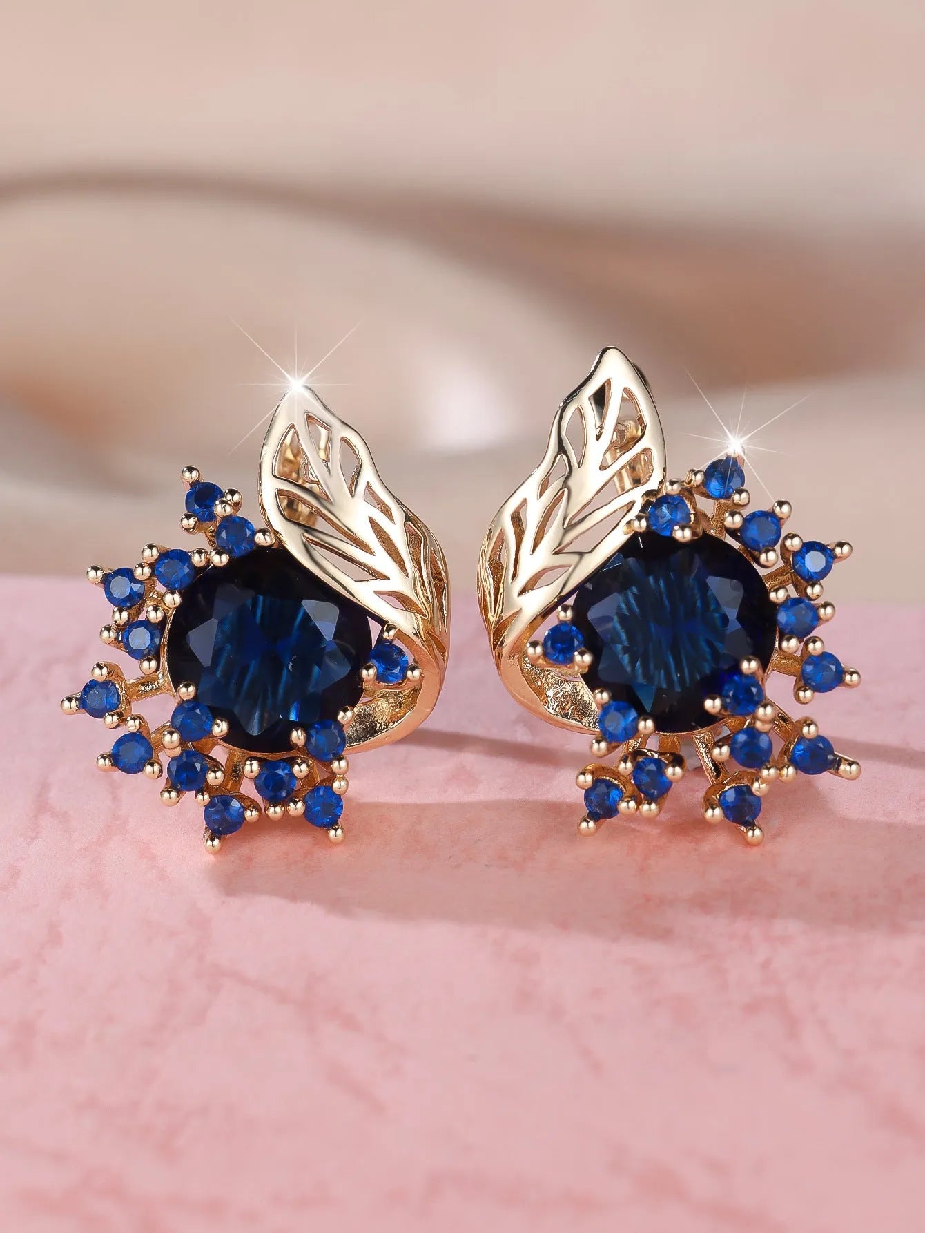Round floral feather earrings with zircon diamonds in rose gold setting