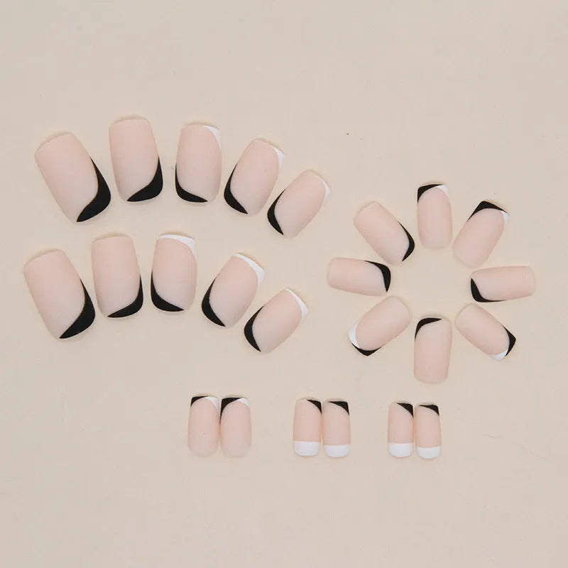 Black and white frosted fashion nails with mandarin duck pattern, plastic wearable armour construction