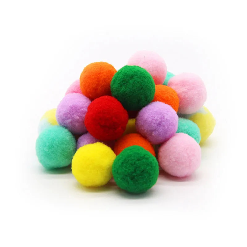 Pet toy ball launcher gun with soft plush yarn balls for interactive play with cats and dogs