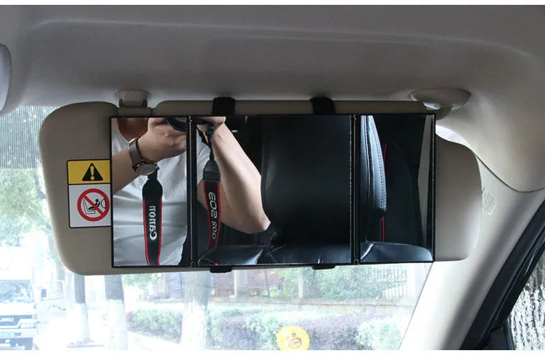 Silver car folding makeup mirror shown both closed and opened to show size difference