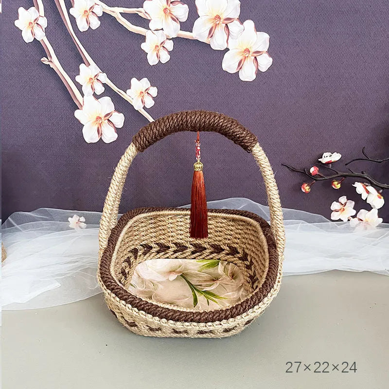 Hand-woven straw basket with hemp rope detailing in rustic farmhouse style
