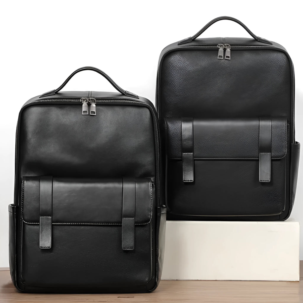 Men's black leather computer backpack with woven detailing and substantial 36-55 litre capacity