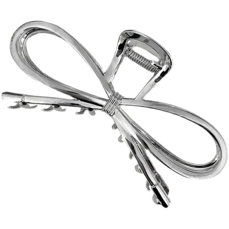 Women's bow barrette hair clip with back head grip in gold or silver alloy metal