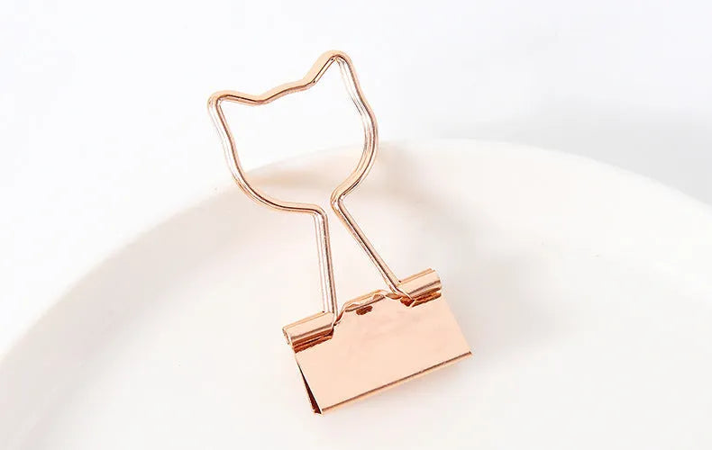 Gold metal office clip with long tail in decorative shape such as flamingo, love, cloud, cat, cactus, or bow design