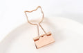 Gold metal office clip with long tail in decorative shape such as flamingo, love, cloud, cat, cactus, or bow design