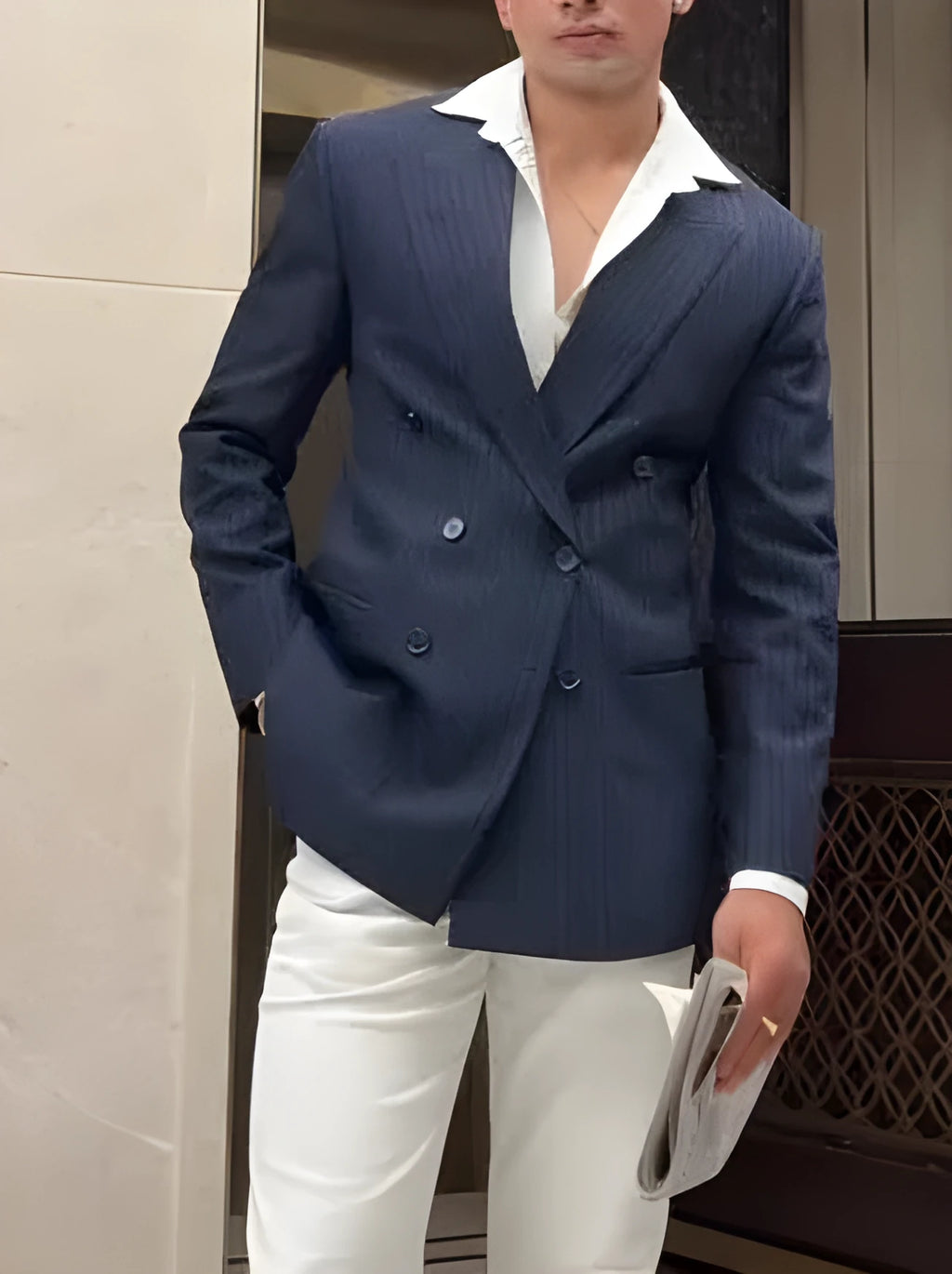 Man wearing a classic striped double breasted polyester blazer in a regular fit