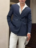 Man wearing a classic striped double breasted polyester blazer in a regular fit