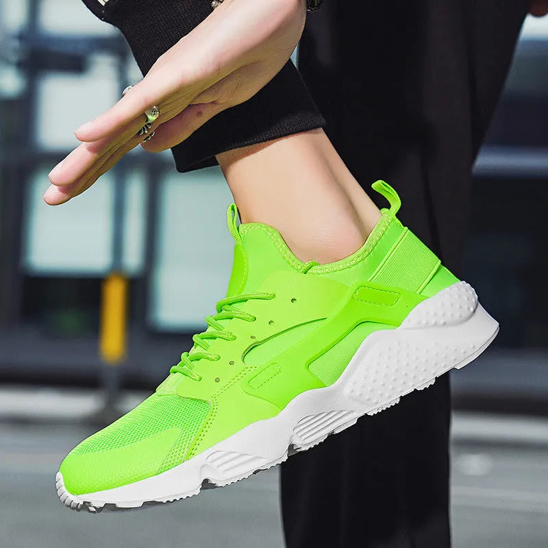 Men's low top casual shoes in mesh with cross straps and flat sole