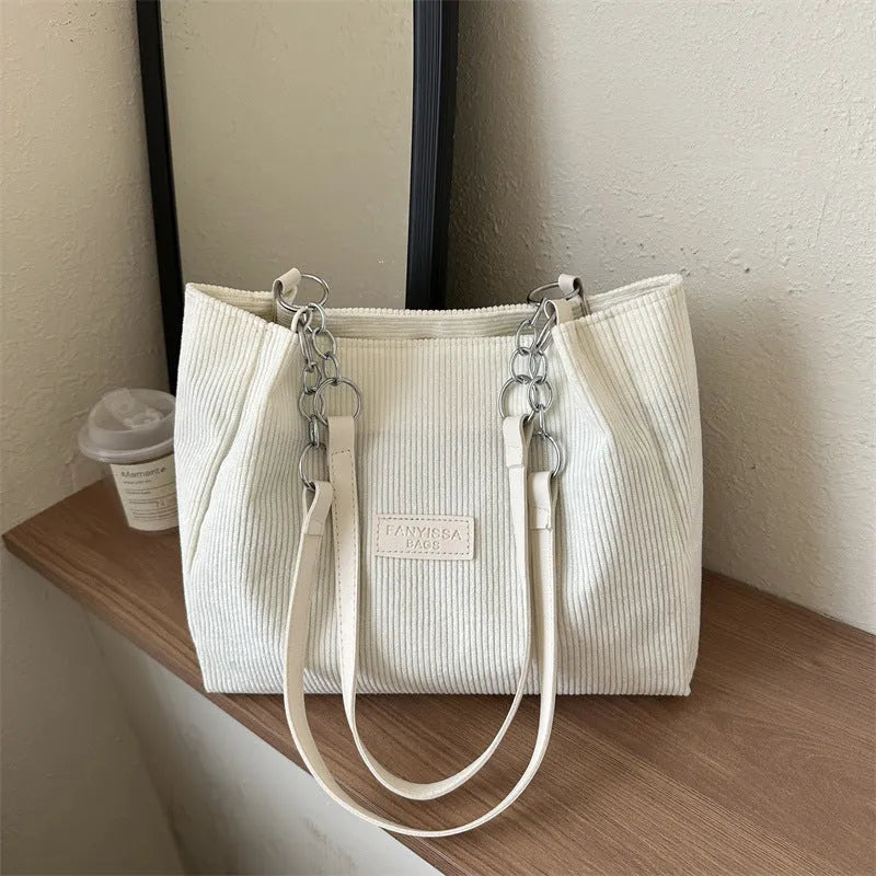 Corduroy one-shoulder tote handbag in horizontal square shape with three-dimensional pockets