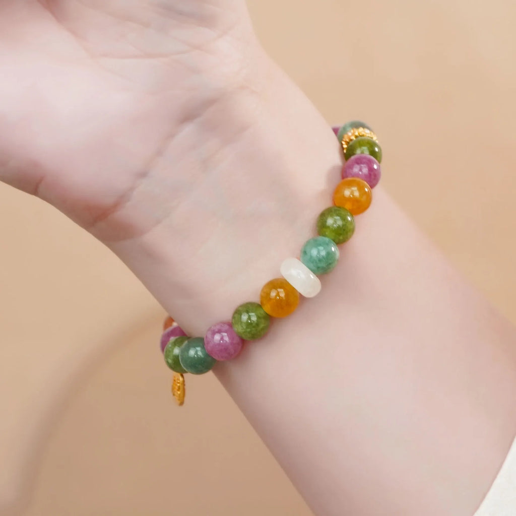 Women's rainbow tourmaline half bracelet with electroplated finish on natural jade pith stones