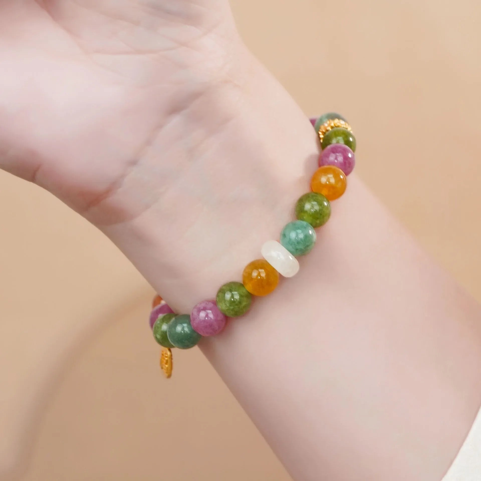 Women's rainbow tourmaline half bracelet with electroplated finish on natural jade pith stones