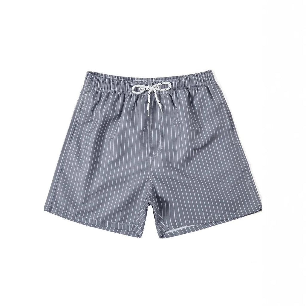 Navy blue striped beach shorts with straight legs on a mannequin.