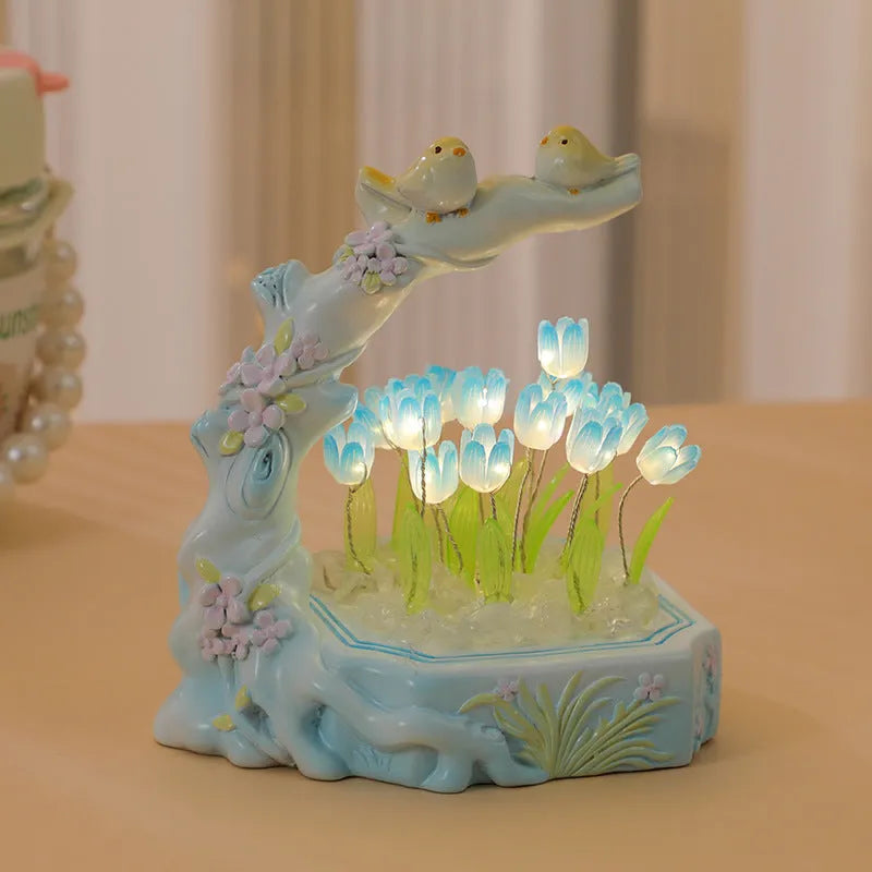 Resin tulip-shaped decorative night light assembled from DIY material package on a desk.