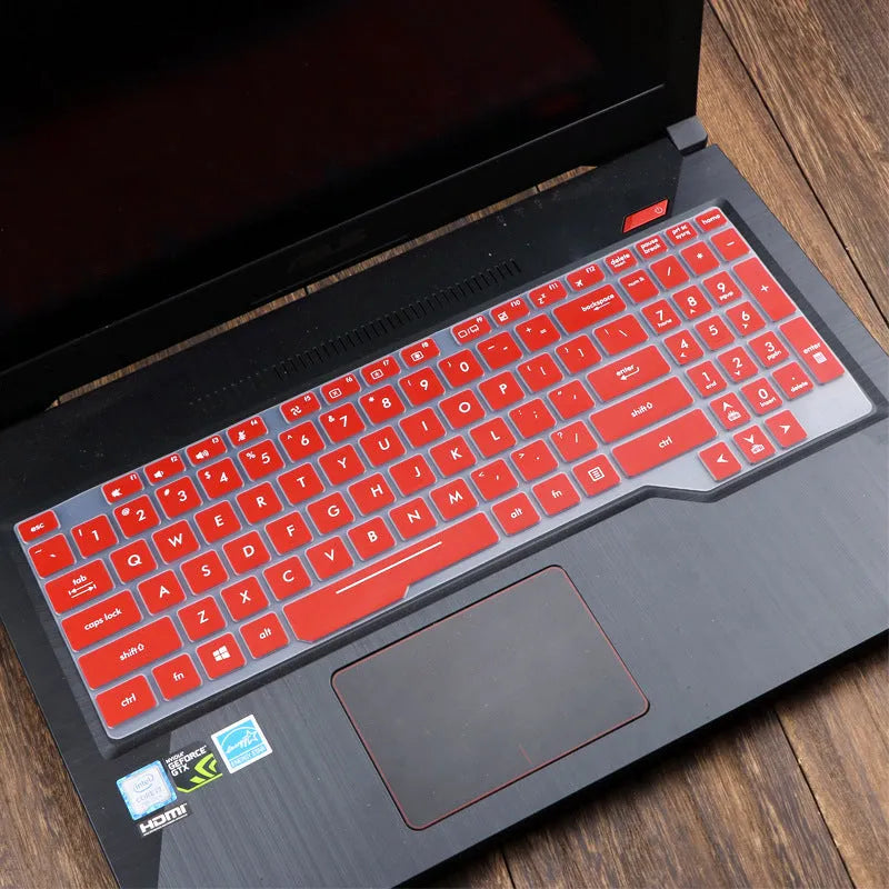 ASUS VivoBook 15 X513 laptop with a translucent mint coloured silicone keyboard protector fitted.