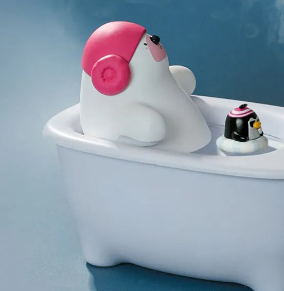 White USB air humidifier with large water tank on a desk.