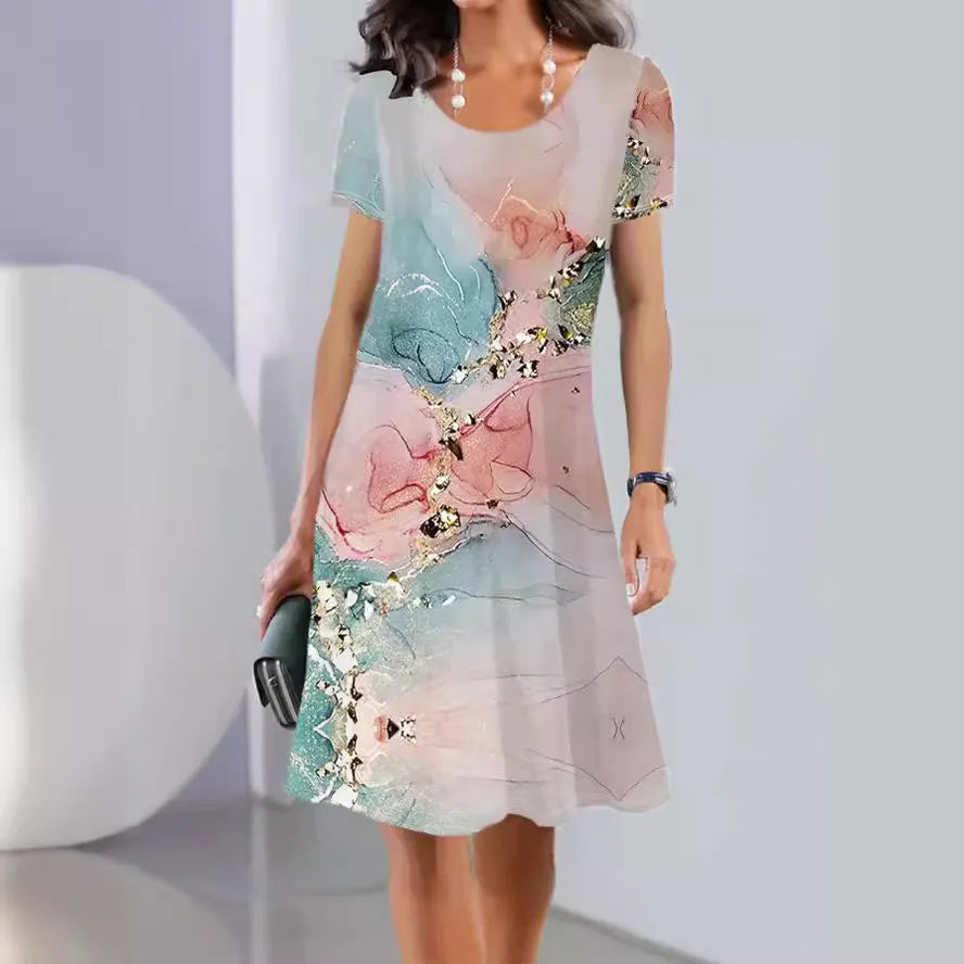 A mid-length floral print dress with short sleeves and a round neckline on a mannequin.