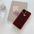 Slim solid colour TPU back cover case for iPhone on a table.