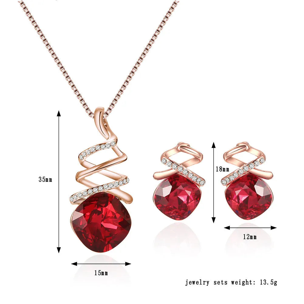 Alloy bridal jewellery set with water wave chain necklace and matching earrings on white background.