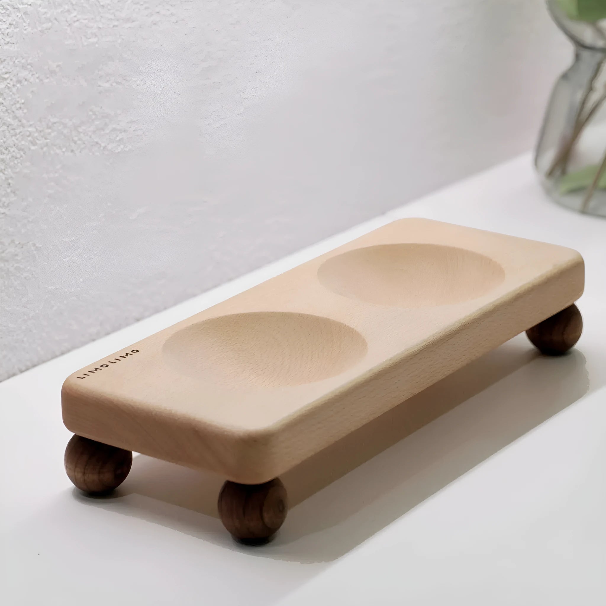 Solid wood cat bowl rack with white ceramic bowl and feeding setup for cats