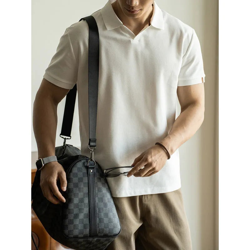 Men's short-sleeve cotton polyester polo shirt in blue, black and white colours showing regular fit design