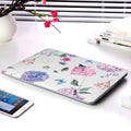Plastic laptop protective shell with floral pattern for Apple MacBook Air and Pro models.