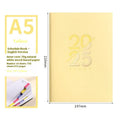 Soft cover A5 daily planner schedule book in blue, showing lay-flat binding and faux leather texture.