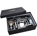 CSB men's shaving set with badger hair brush, chrome safety razor, stand, bowl, and blades in a black box.