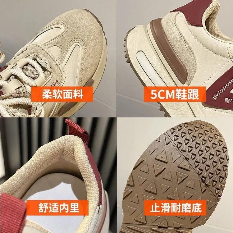 Women's black retro platform sports shoes with round toe and lace-up fastening on a neutral background.