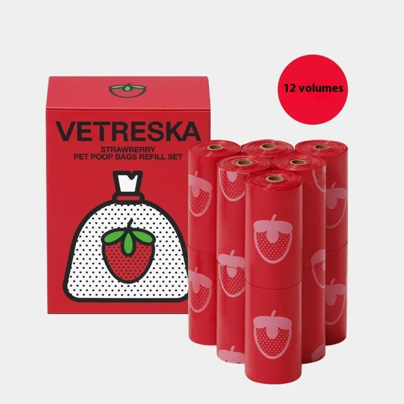 Portable dog poop picking bag capsule with scented inner bags in strawberry, orange, and cherry blossom patterns
