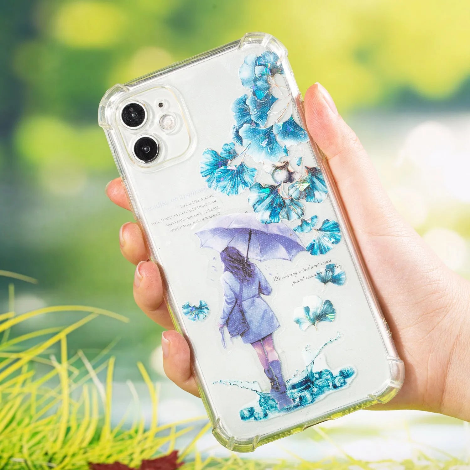 Roll of nature-themed decorative stickers showing ginkgo leaves, maple leaves, and blue fallen leaves designs
