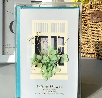 Handmade 3D butterfly-shaped birthday card with artificial flowers and hot foil stamping details.